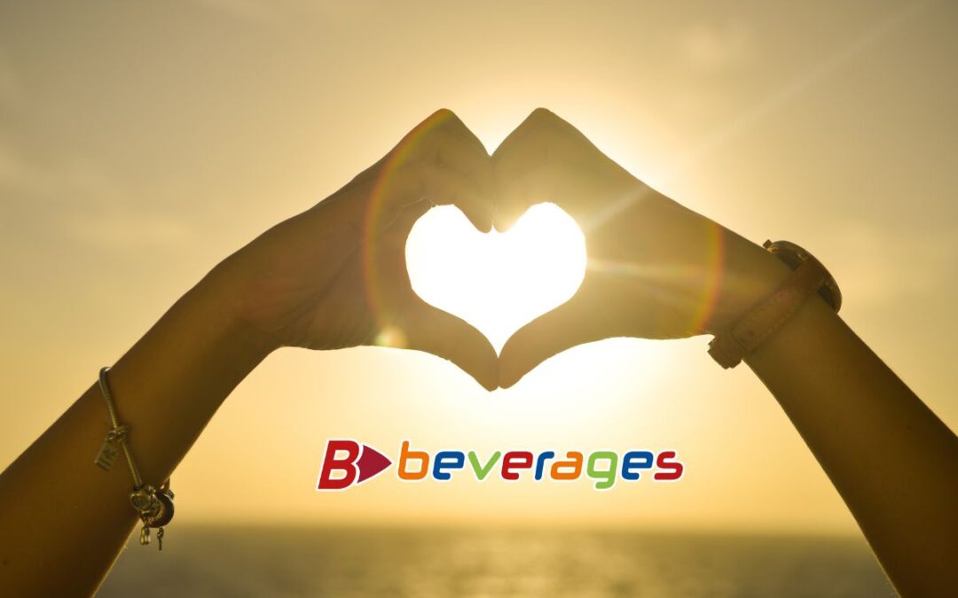 hands forming a heart around the sun at summer solstice with an overlay of the B Beverages logo
